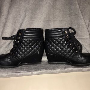Black faux leather wedged booties